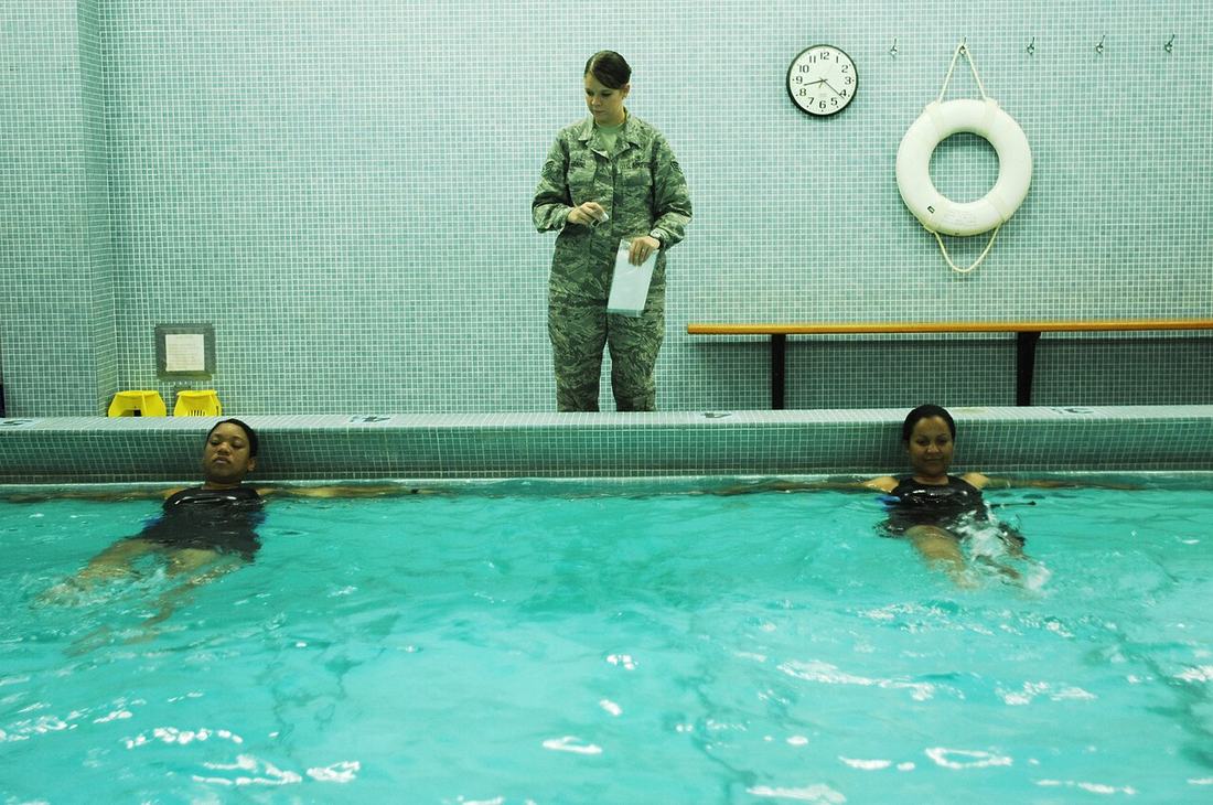 Physical therapy session in a pool