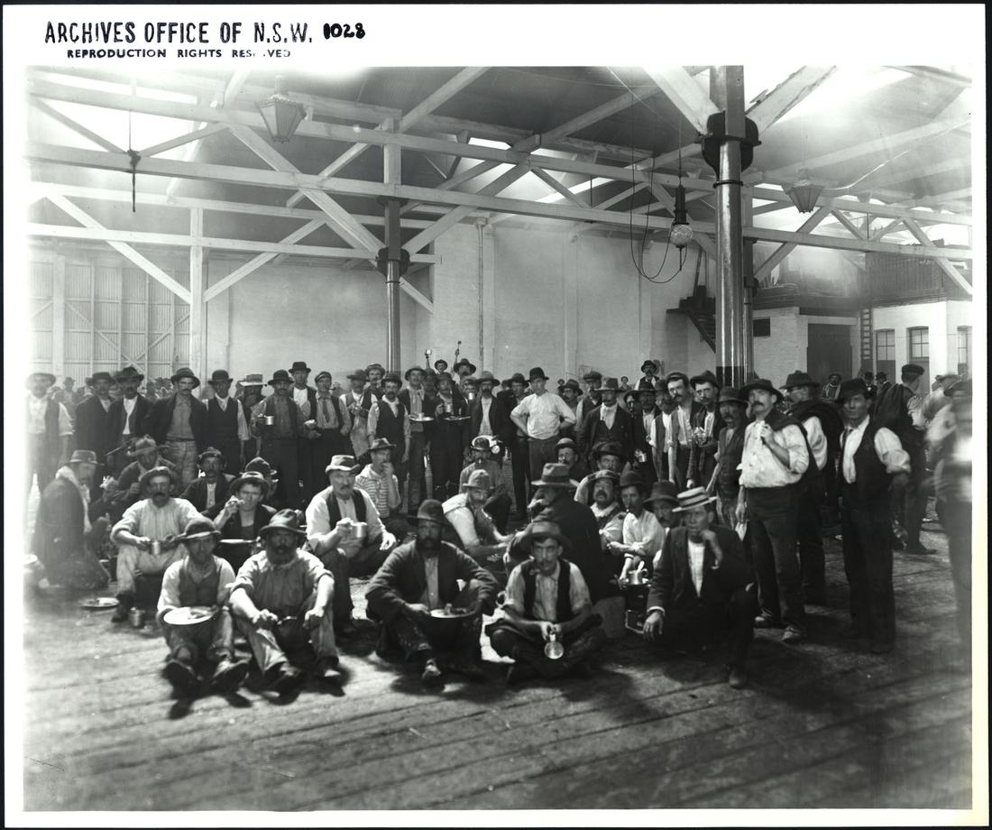 Warehouse workers gathered at lunch in 1913