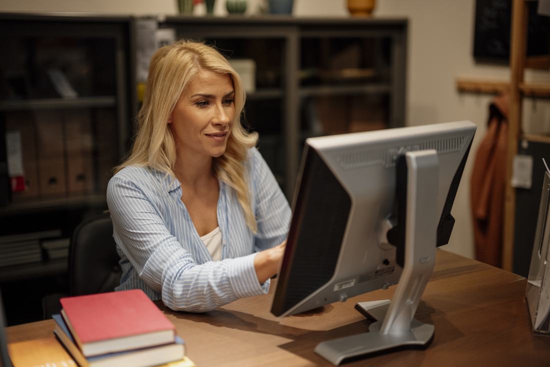 Woman working at a desk in an office